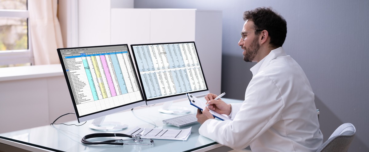 medical professional analyzing gross collection ratio